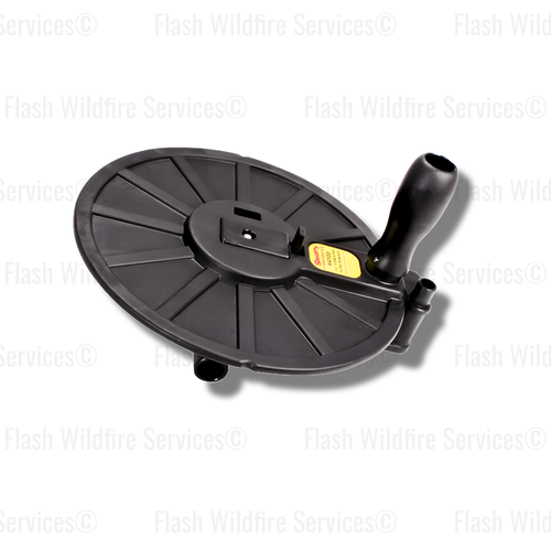 Black Scotty Firefighter 4100 forestry hose winder shown at an angle with circular winding plate, crank handle and hose guide fittings
