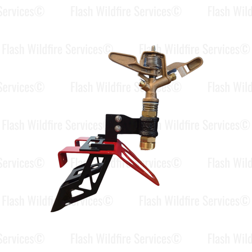 Brass sprinkler head with red and black mounting bracket on a white background